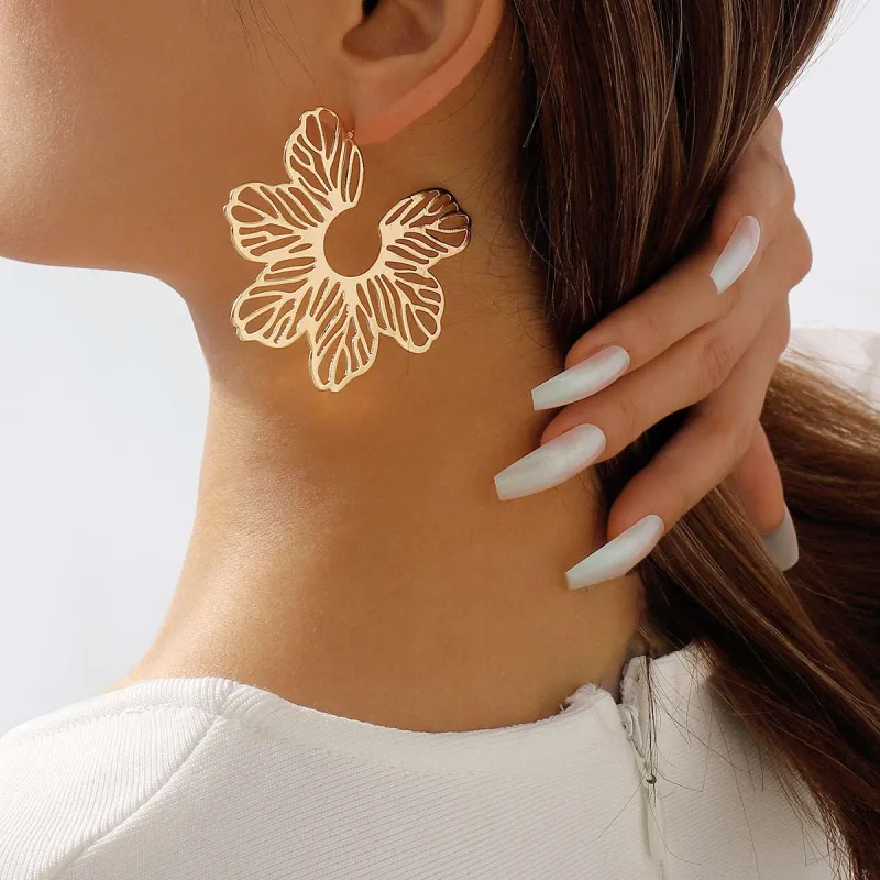 Goldtone Cutout Flower Huggie Earrings made by Zulily