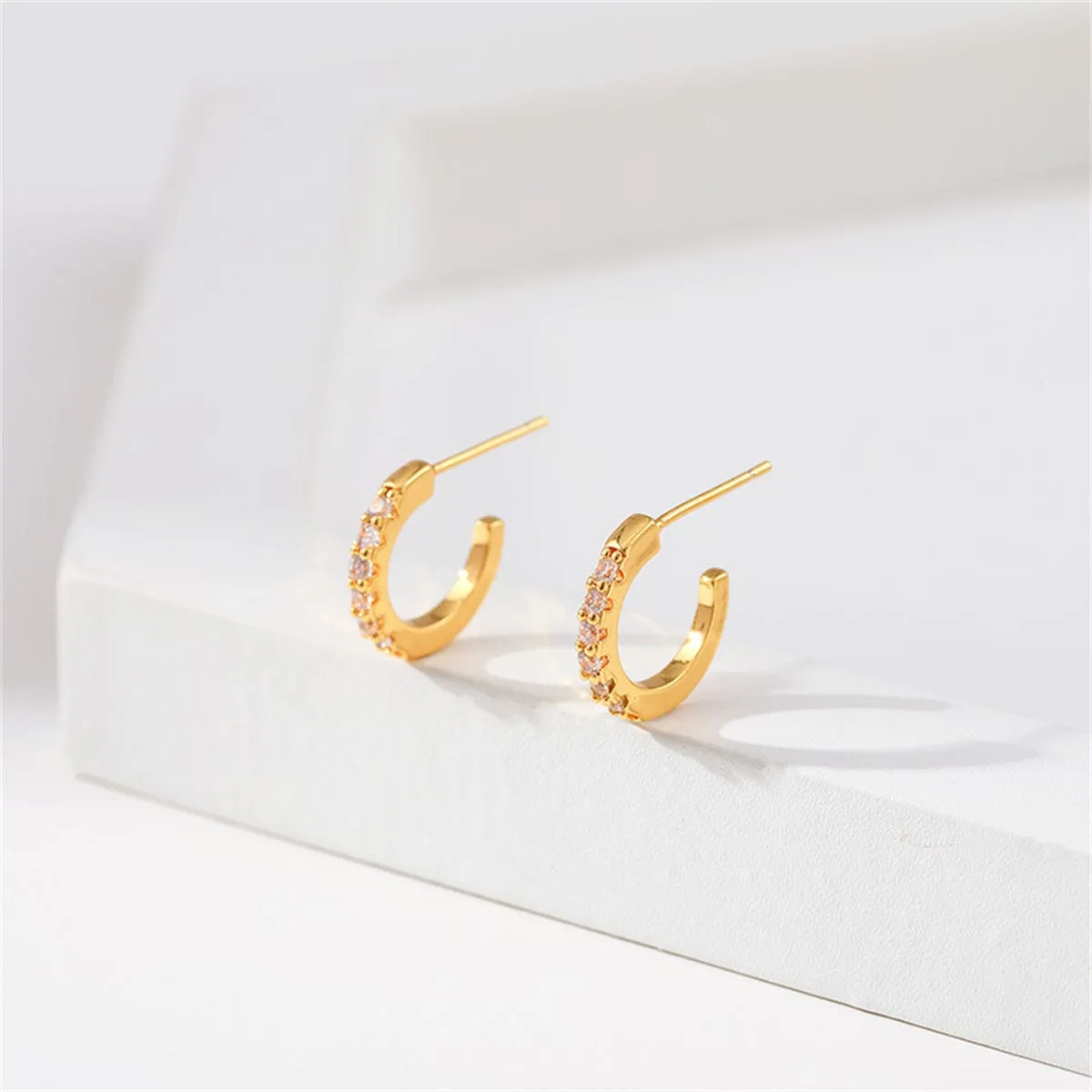 Cubic Zirconia & Goldtone Open Huggie Earrings sold by Zulily product image thumbnail 2