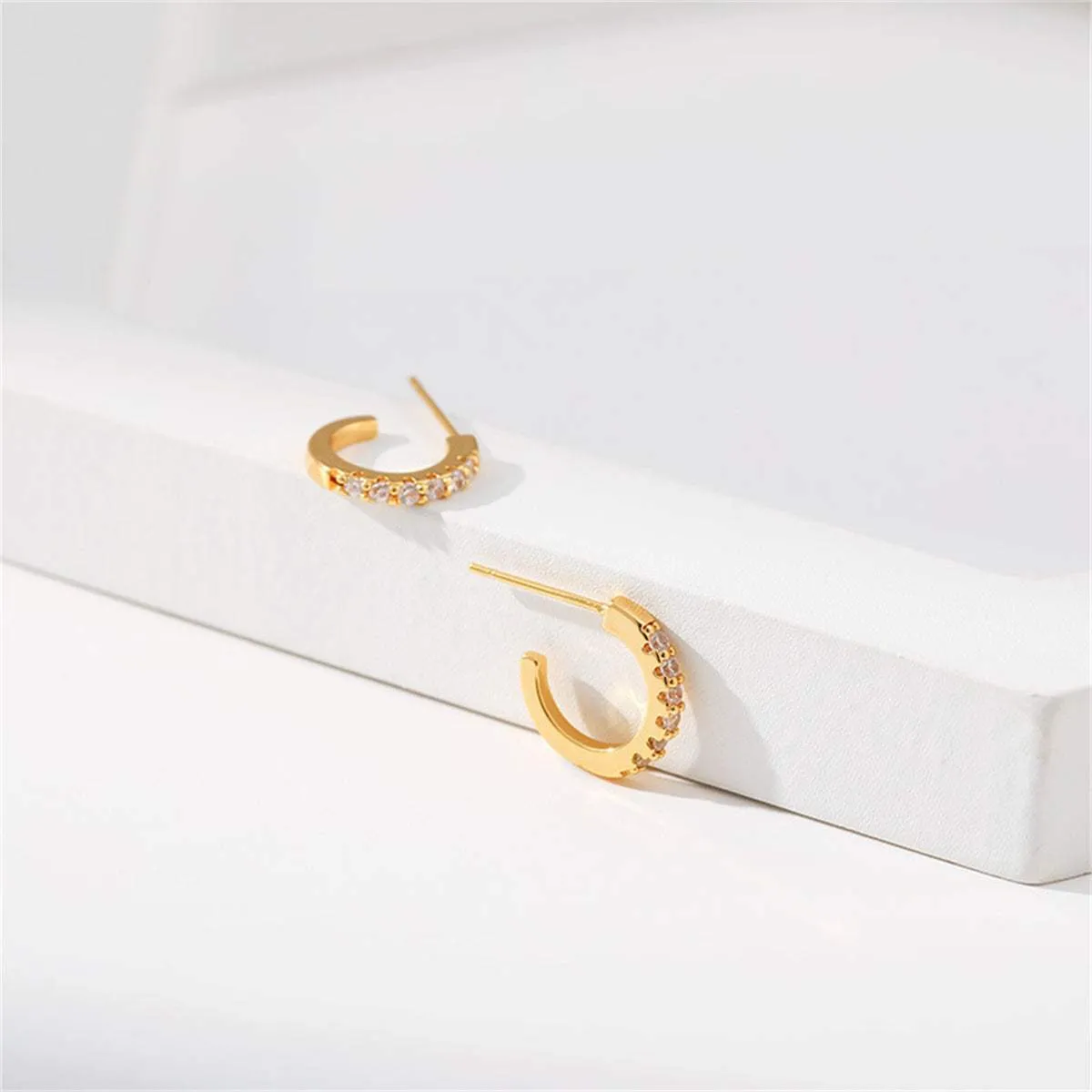 Cubic Zirconia & Goldtone Open Huggie Earrings sold by Zulily product image thumbnail 3