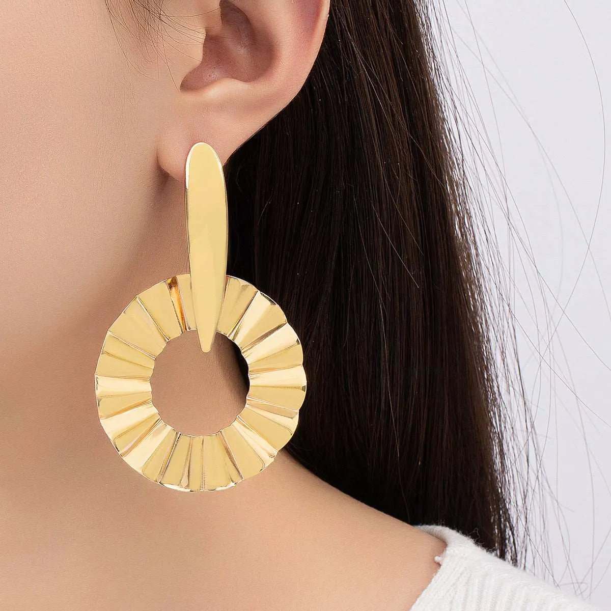 Goldtone Open Lotus Leaf Drop Earrings sold by Zulily
