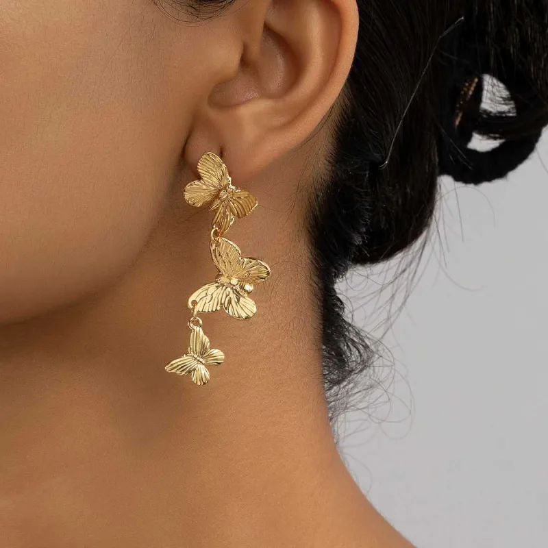 Goldtone Textured Linked Butterfly Drop Earrings made by Zulily