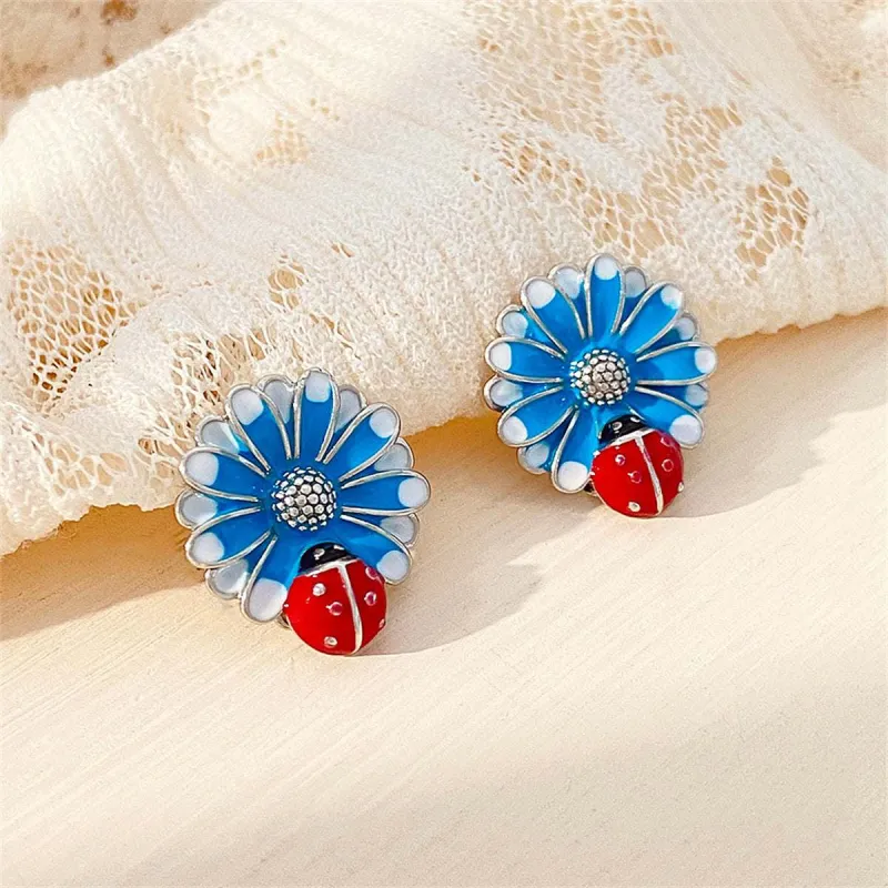 Blue Enamel & Silvertone Floral Ladybug Stud Earrings made by Zulily