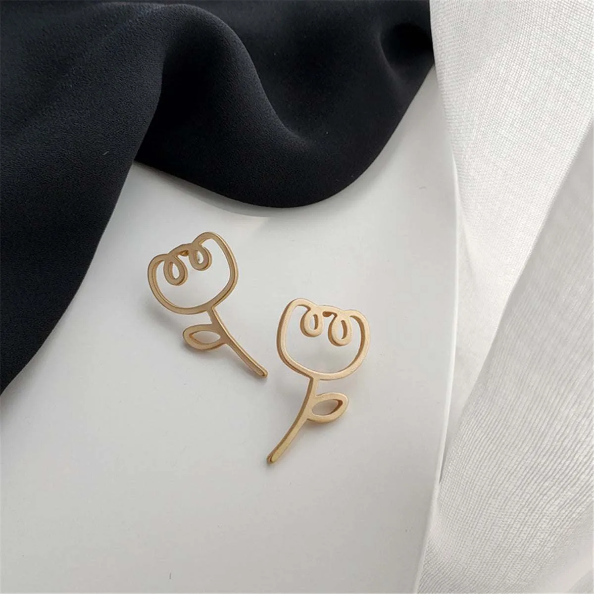 Goldtone Openwork Flower Stud Earrings sold by Zulily product image thumbnail 3
