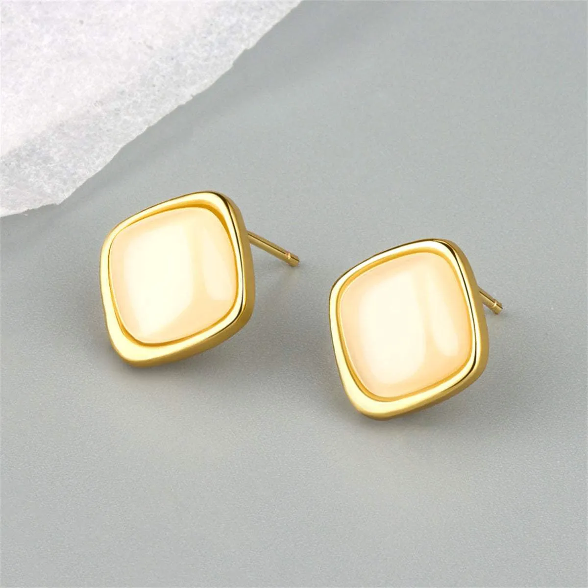 Cats Eye & Goldtone Rhombus Stud Earrings sold by Zulily