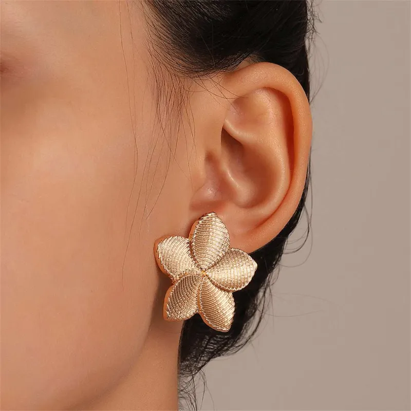 Goldtone Textured Flower Stud Earrings made by Zulily
