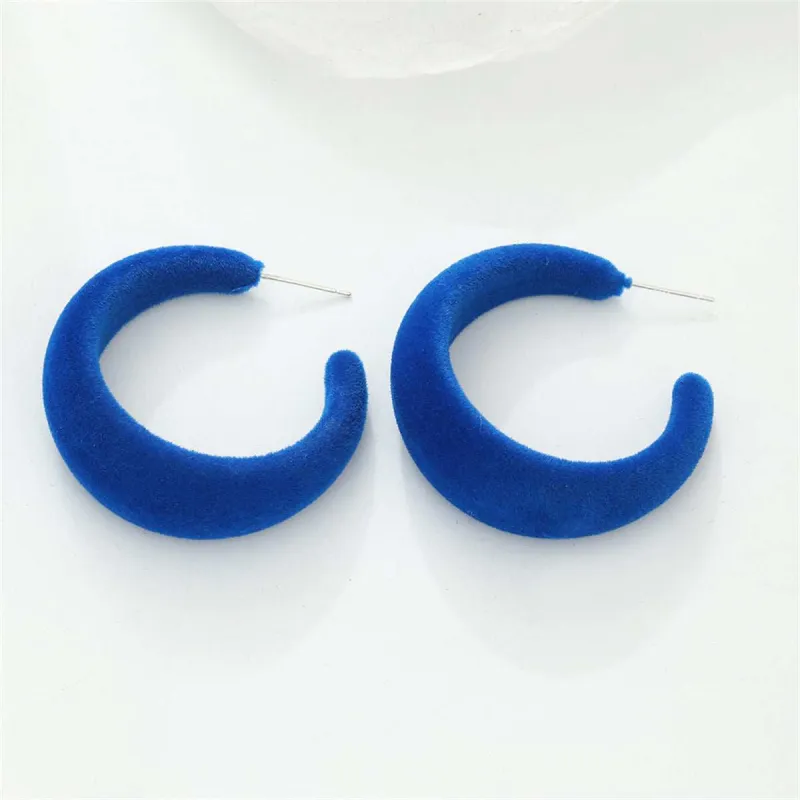 Blue Flocking & Silvertone Huggie Earrings made by Zulily