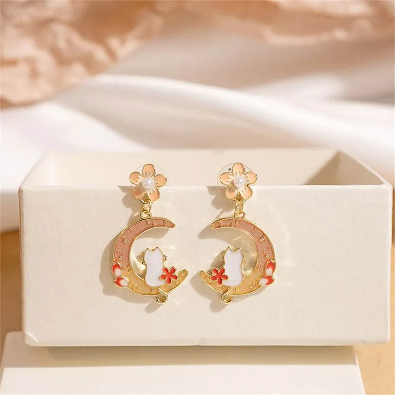 Light Peach Enamel & Pearl Flower Cat Moon Drop Earrings made by Zulily