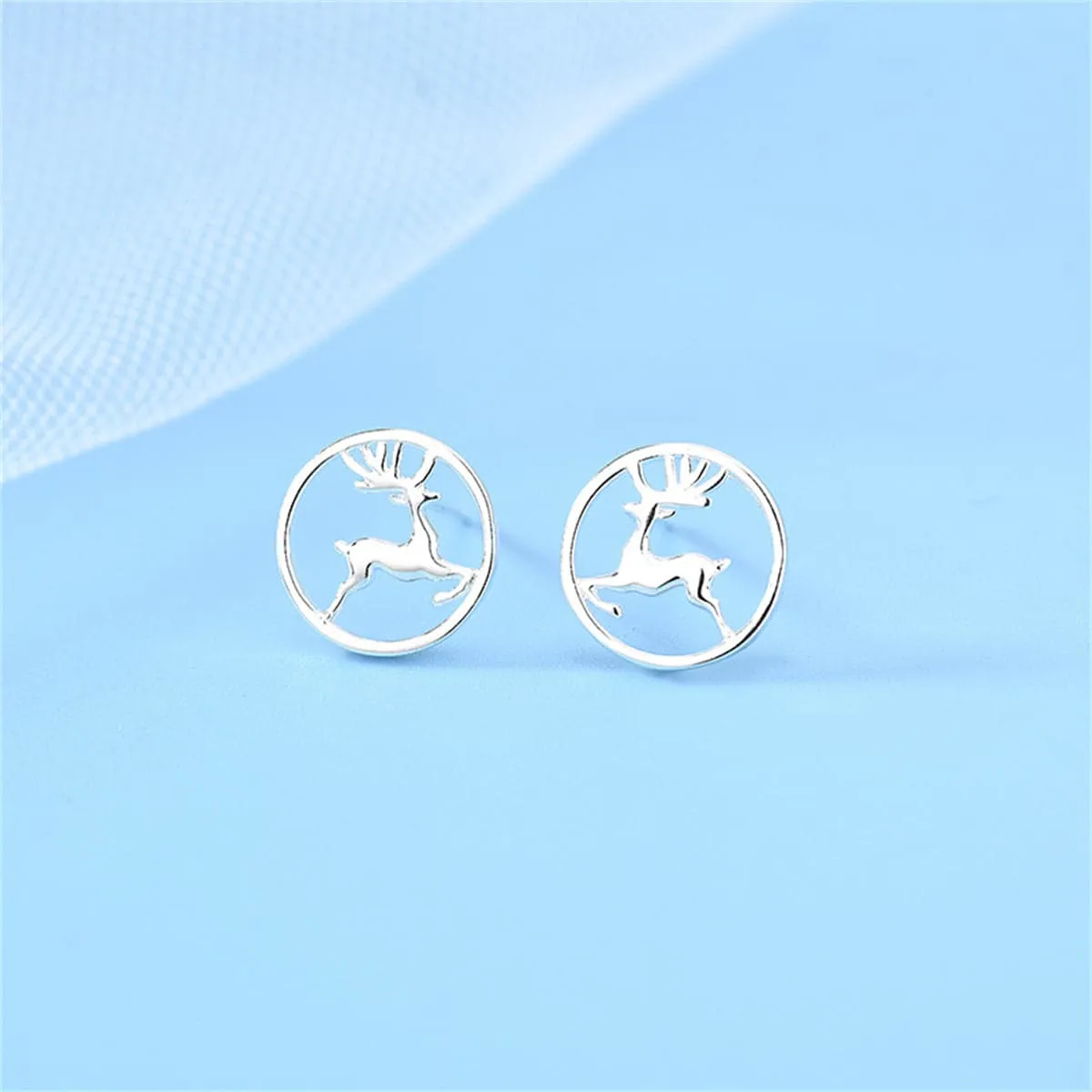 Silvertone Reindeer Round Stud Earrings sold by Zulily