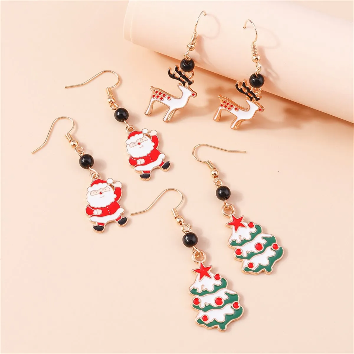 White & Red Holiday Drop Earrings Set sold by Zulily