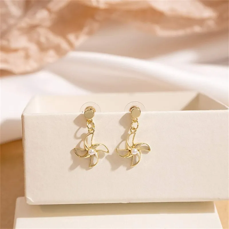 Pearl & Goldtone Openwork Windmills Drop Earrings made by Zulily