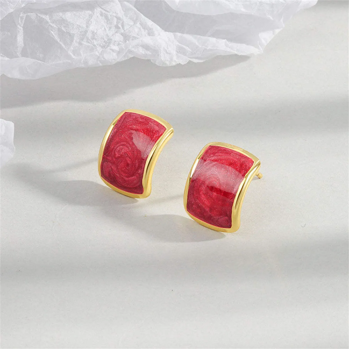 Red Enamel & Goldtone Curved Face Stud Earrings sold by Zulily
