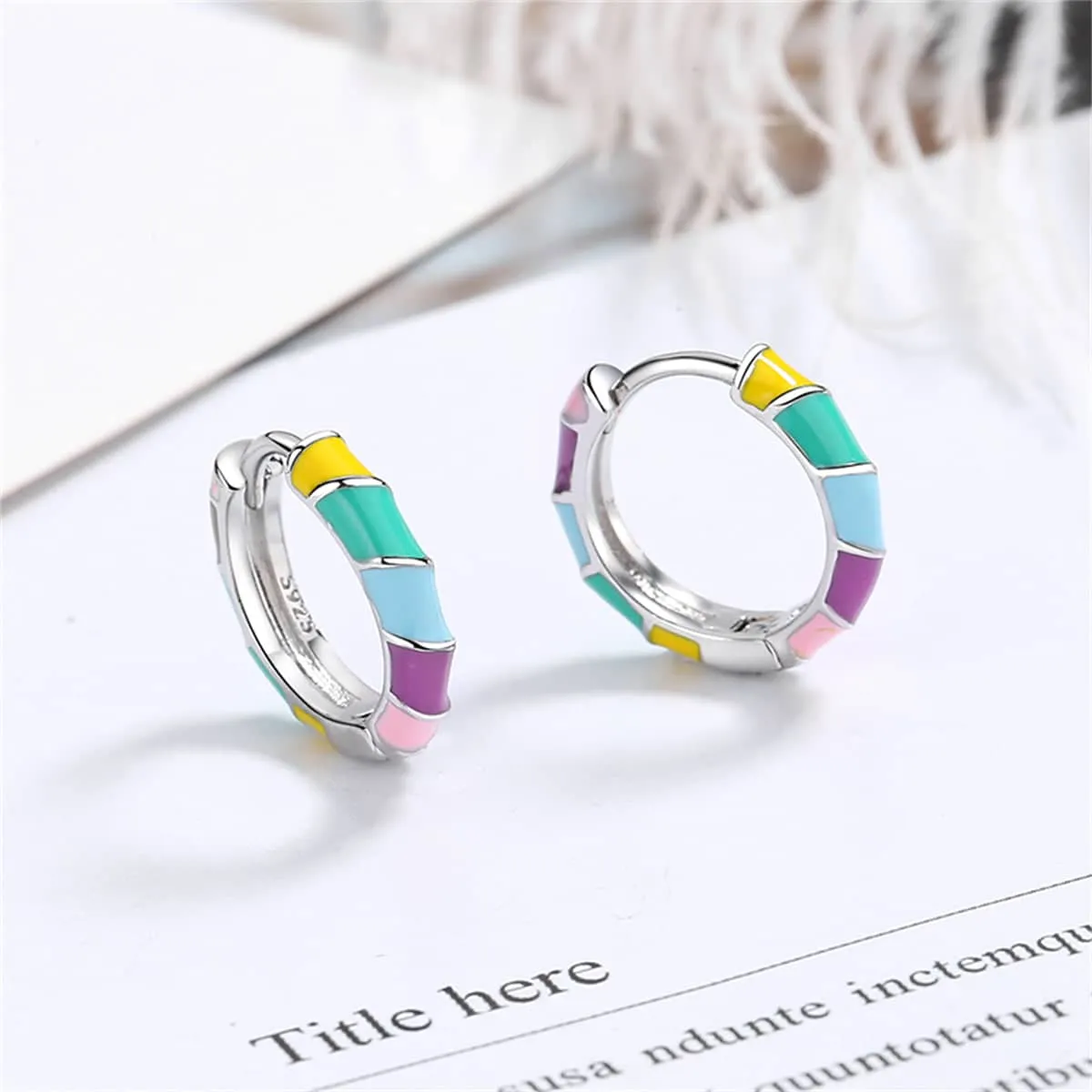 Yellow Enamel & Silvertone Stripe Huggie Earrings sold by Zulily