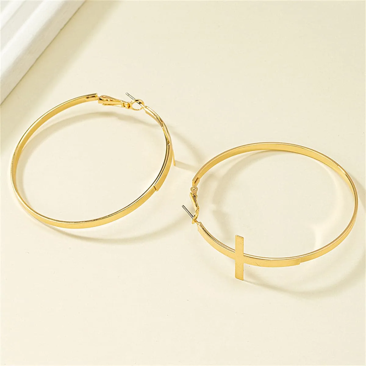 Goldtone Cross Hoop Earrings sold by Zulily product image thumbnail 3