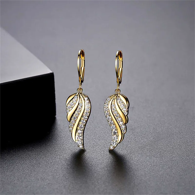 Cubic Zirconia & Goldtone Wing Charm Huggie Earrings made by Zulily