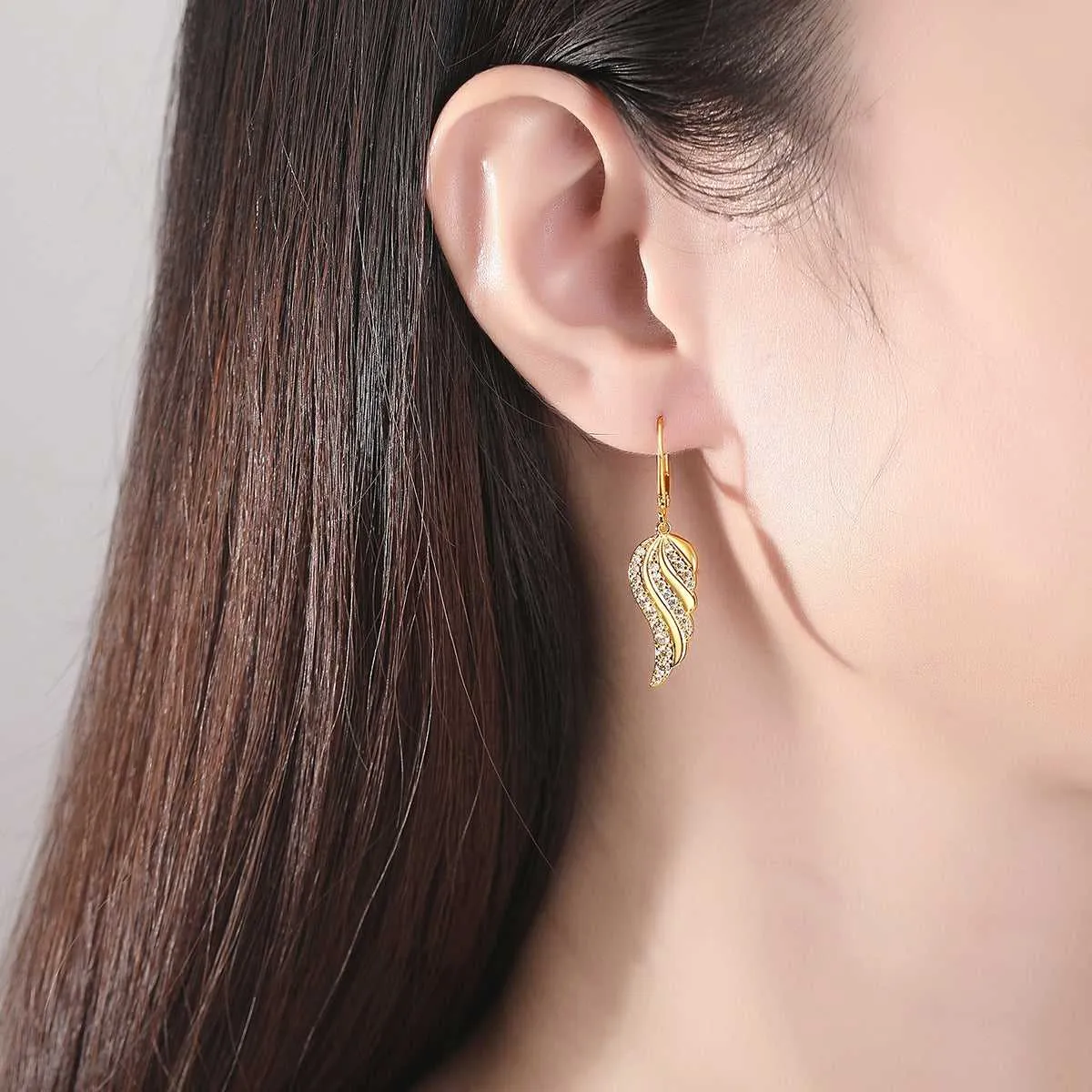 Cubic Zirconia & Goldtone Wing Charm Huggie Earrings sold by Zulily product image thumbnail 3