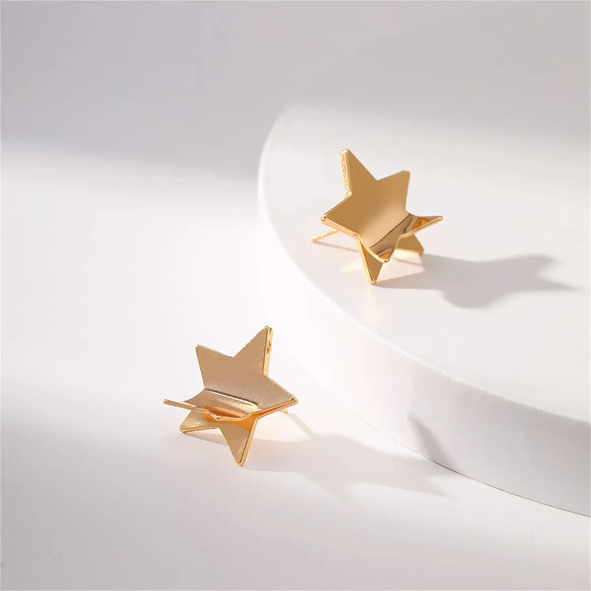 Goldtone Folded Star Stud Earrings sold by Zulily product image thumbnail 2