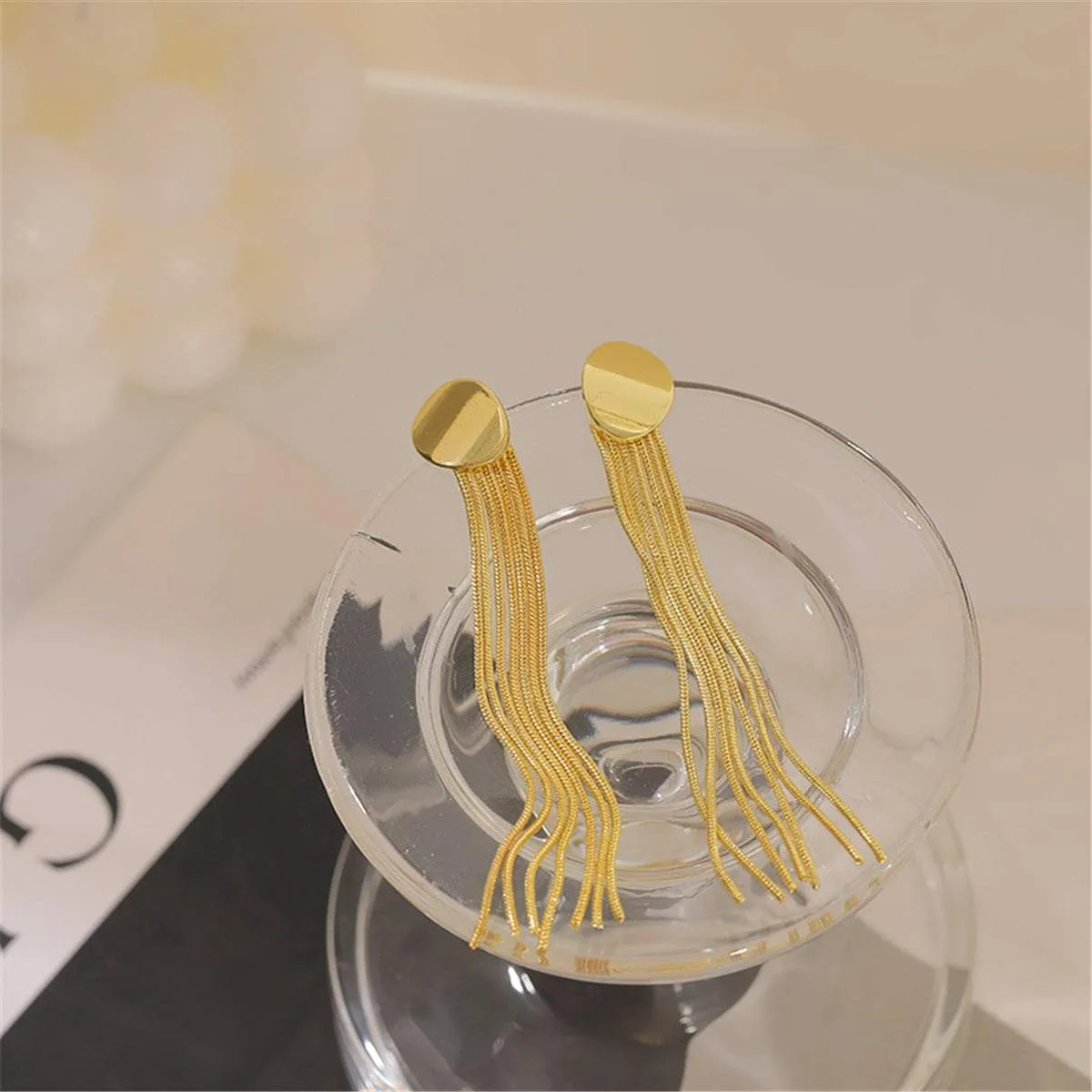 Goldtone Oval Tassel Drop Earrings sold by Zulily product image thumbnail 3