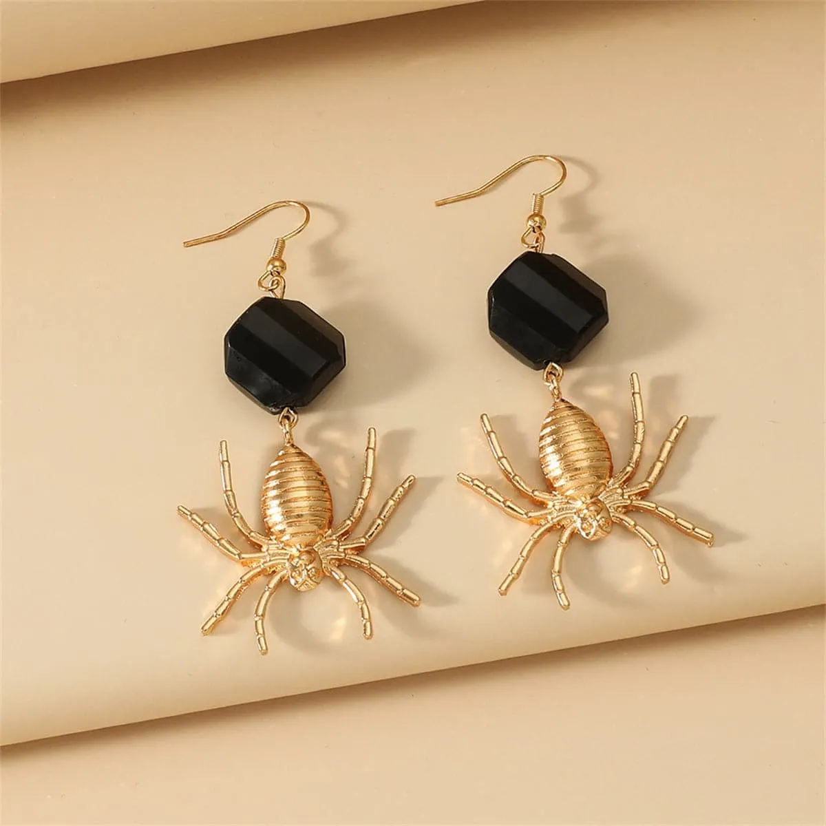 Black Acrylic & Goldtone Spider Drop Earrings sold by Zulily