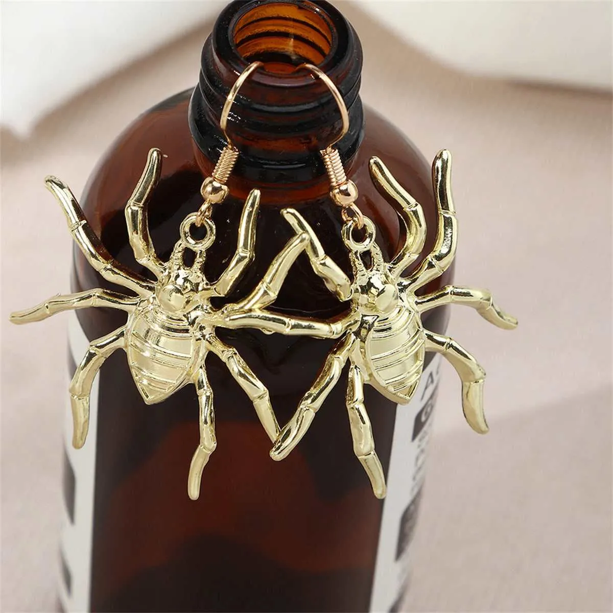Goldtone Spider Drop Earrings sold by Zulily product image thumbnail 3