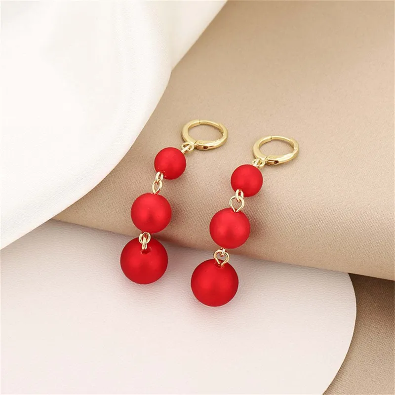 Red Frosted Resin & Goldtone Beads Huggie Earrings made by Zulily