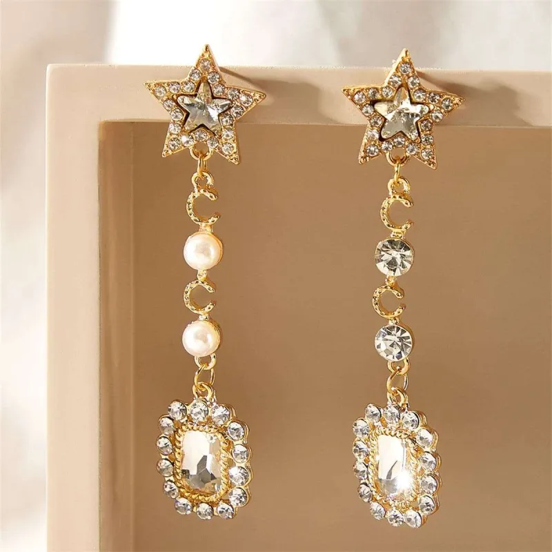 Pearl & Cubic Zirconia Goldtone Star Drop Earrings made by Zulily