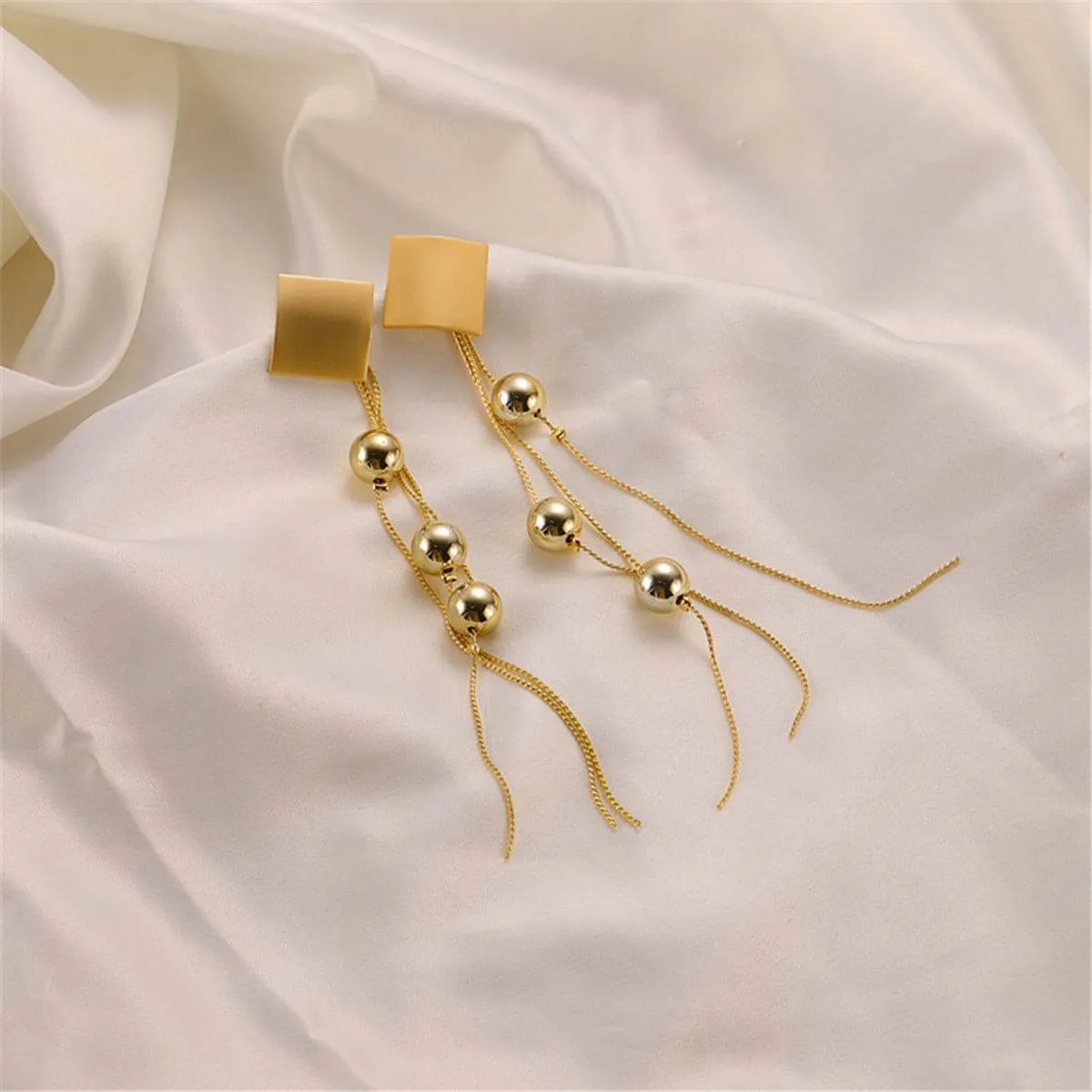 Goldtone Diamond-Shape Beaded Tassel Drop Earrings sold by Zulily
