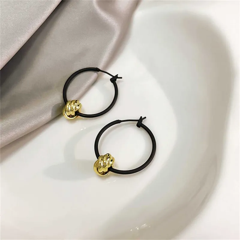 Black & Goldtone Ball Hoop Earrings made by Zulily