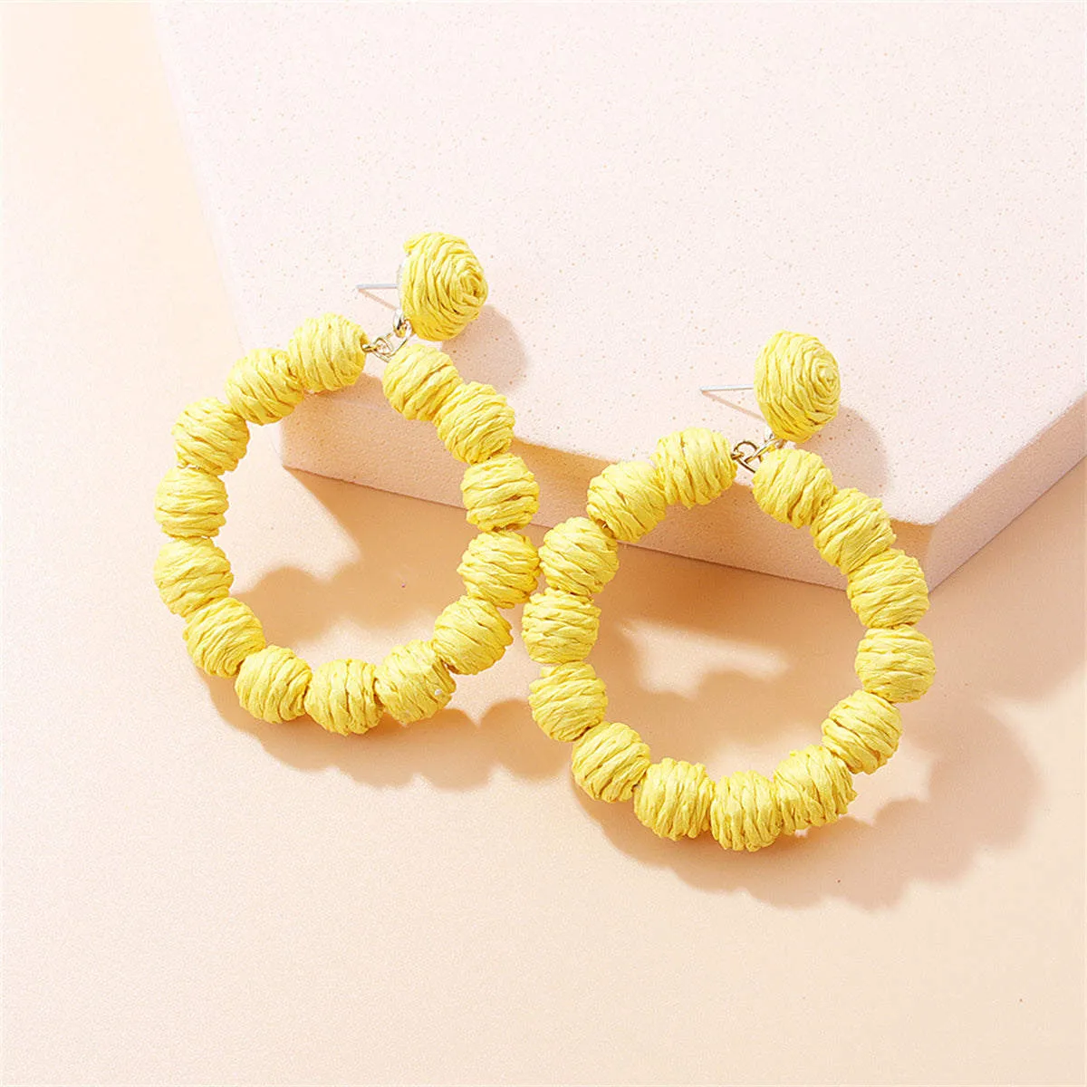Yellow Raffia Ring Drop Earrings sold by Zulily