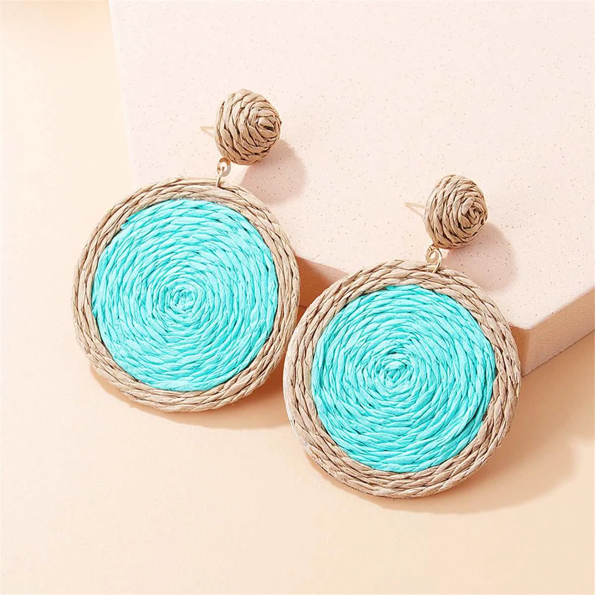 Cyan & Beige Raffia Round Drop Earrings sold by Zulily