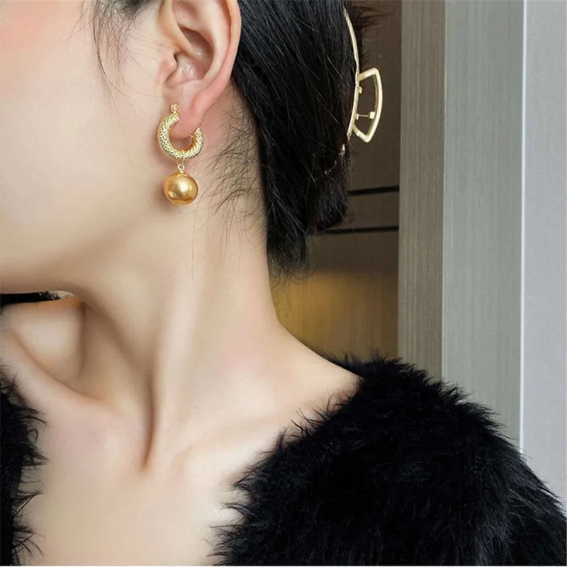 Champagne Pearl & Goldtone Twine Charm Huggie Earrings made by Zulily