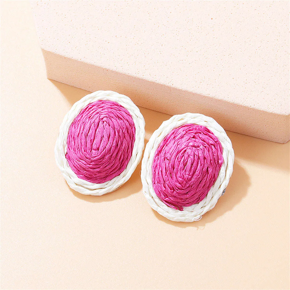Rose & White Raffia Oval Stud Earrings sold by Zulily