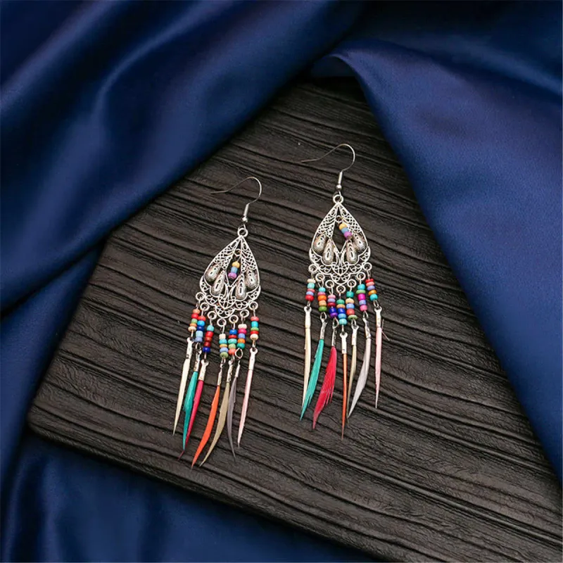 Howlite & Silvertone Feather-Accent Drop Earrings made by Zulily