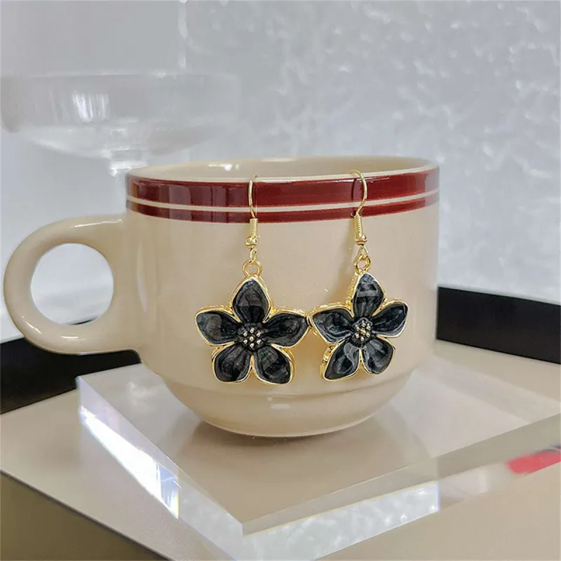 Black Enamel & Goldtone Flower Drop Earrings made by Zulily