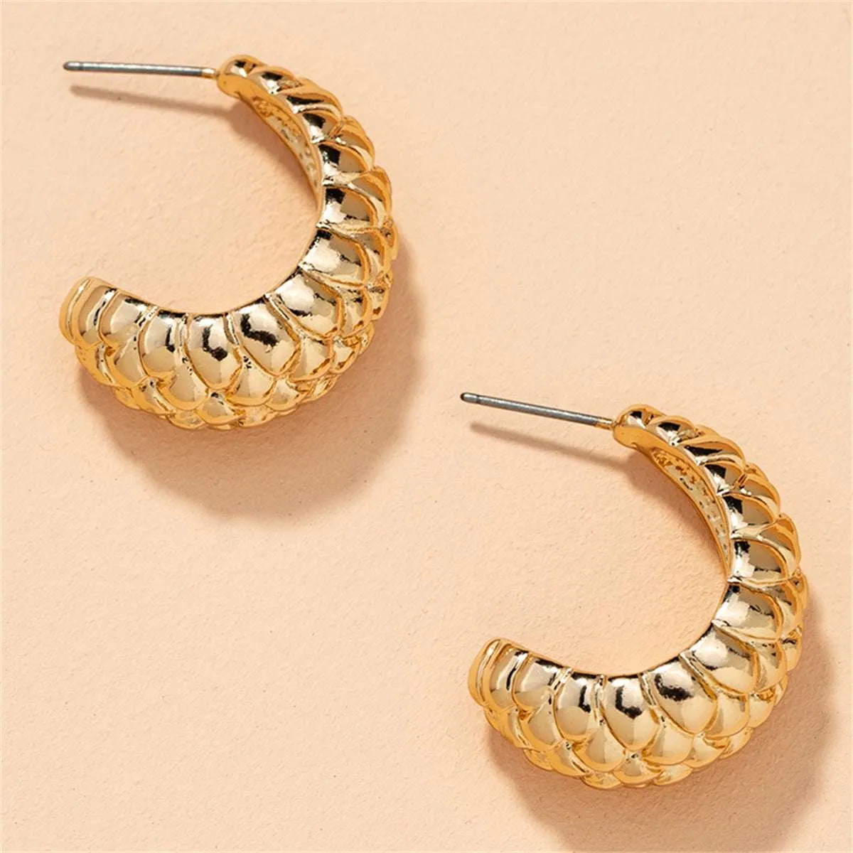 Goldtone Litchin Grain Huggie Earrings sold by Zulily product image thumbnail 2
