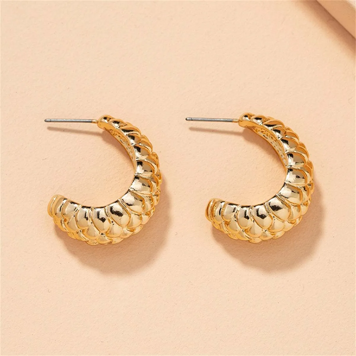 Goldtone Litchin Grain Huggie Earrings sold by Zulily product image thumbnail 3