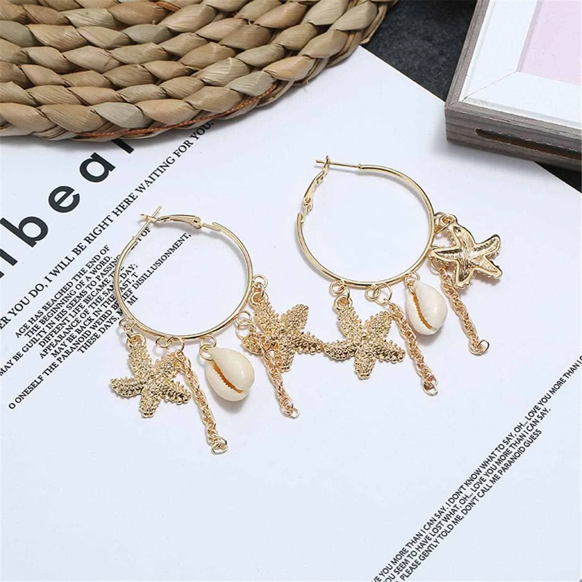 Goldtone Star & Shell Charm Hoop Earrings sold by Zulily product image thumbnail 3