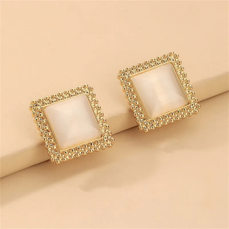 Cats Eye & Goldtone Square Stud Earrings made by Zulily