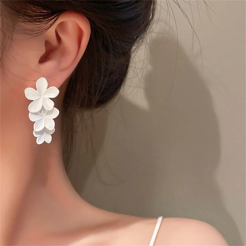 White Enamel & Silvertone Linked Flower Drop Earrings made by Zulily