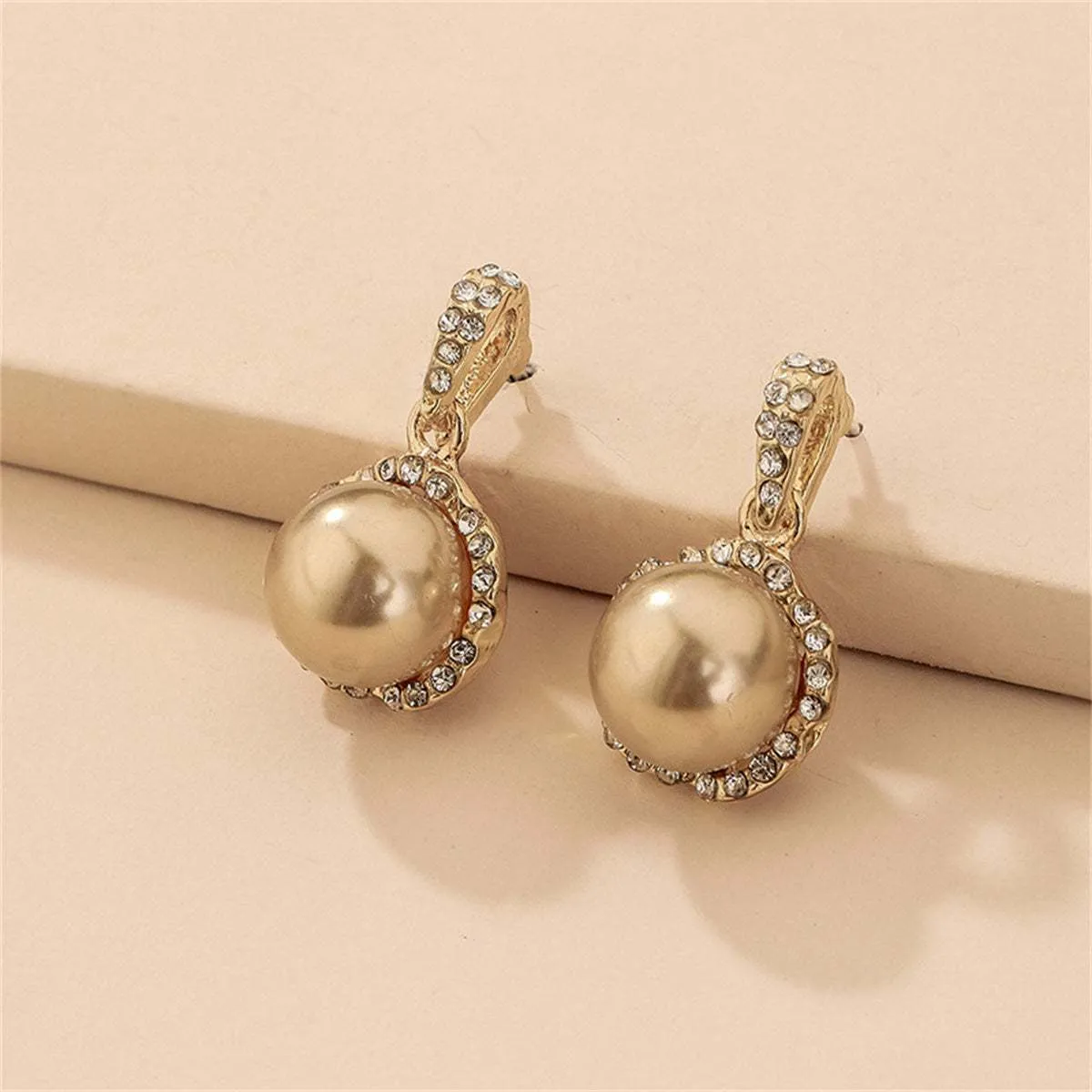 Cubic Zirconia & Pearl Goldtone Round Drop Earrings sold by Zulily
