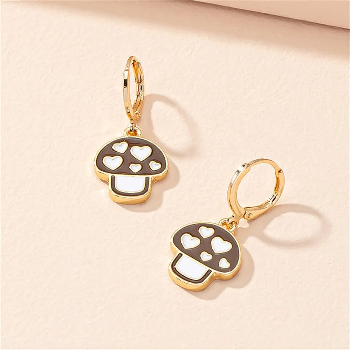 Brown & White Mushroom Huggie Earrings sold by Zulily product image thumbnail 2