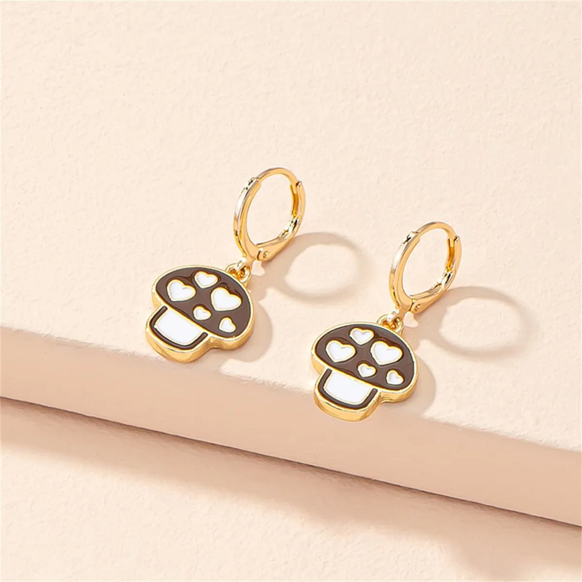 Brown & White Mushroom Huggie Earrings sold by Zulily product image thumbnail 3
