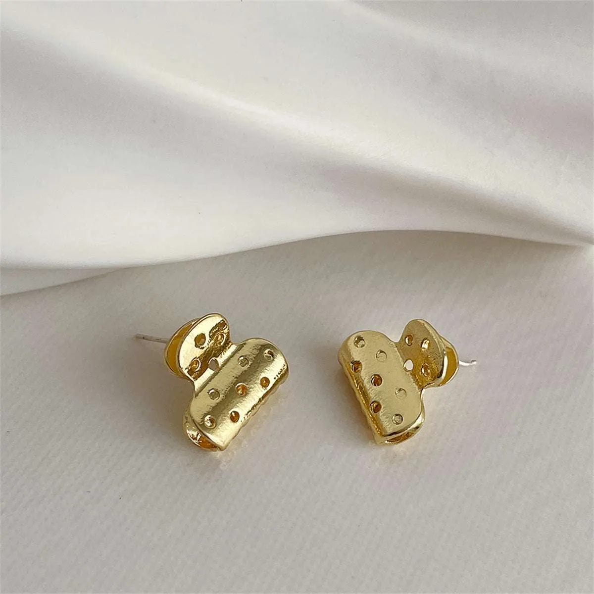 Goldtone File Clip Stud Earrings sold by Zulily product image thumbnail 3