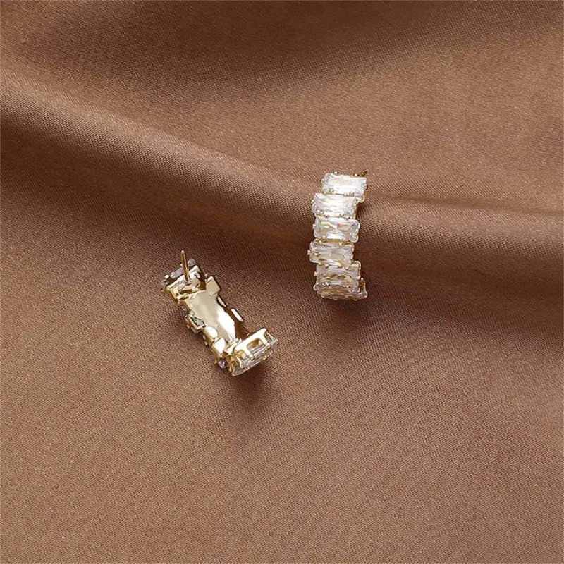 Crystal & Goldtone Offset Baguette-Cut Huggie Earrings made by Zulily