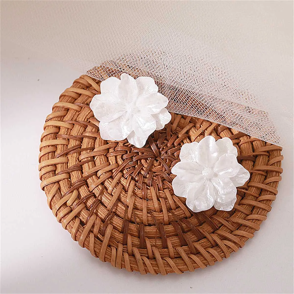 White Acrylic Flower Stud Earrings sold by Zulily product image thumbnail 2