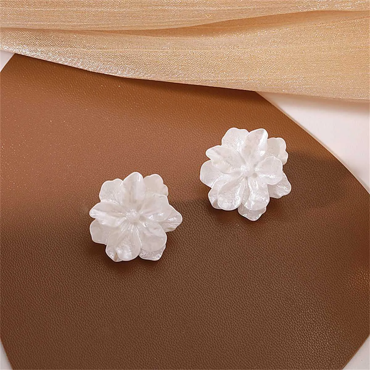 White Acrylic Flower Stud Earrings sold by Zulily product image thumbnail 3