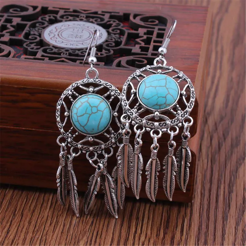 Turquoise & Silvertone Circle & Feather Drop Earrings made by Zulily
