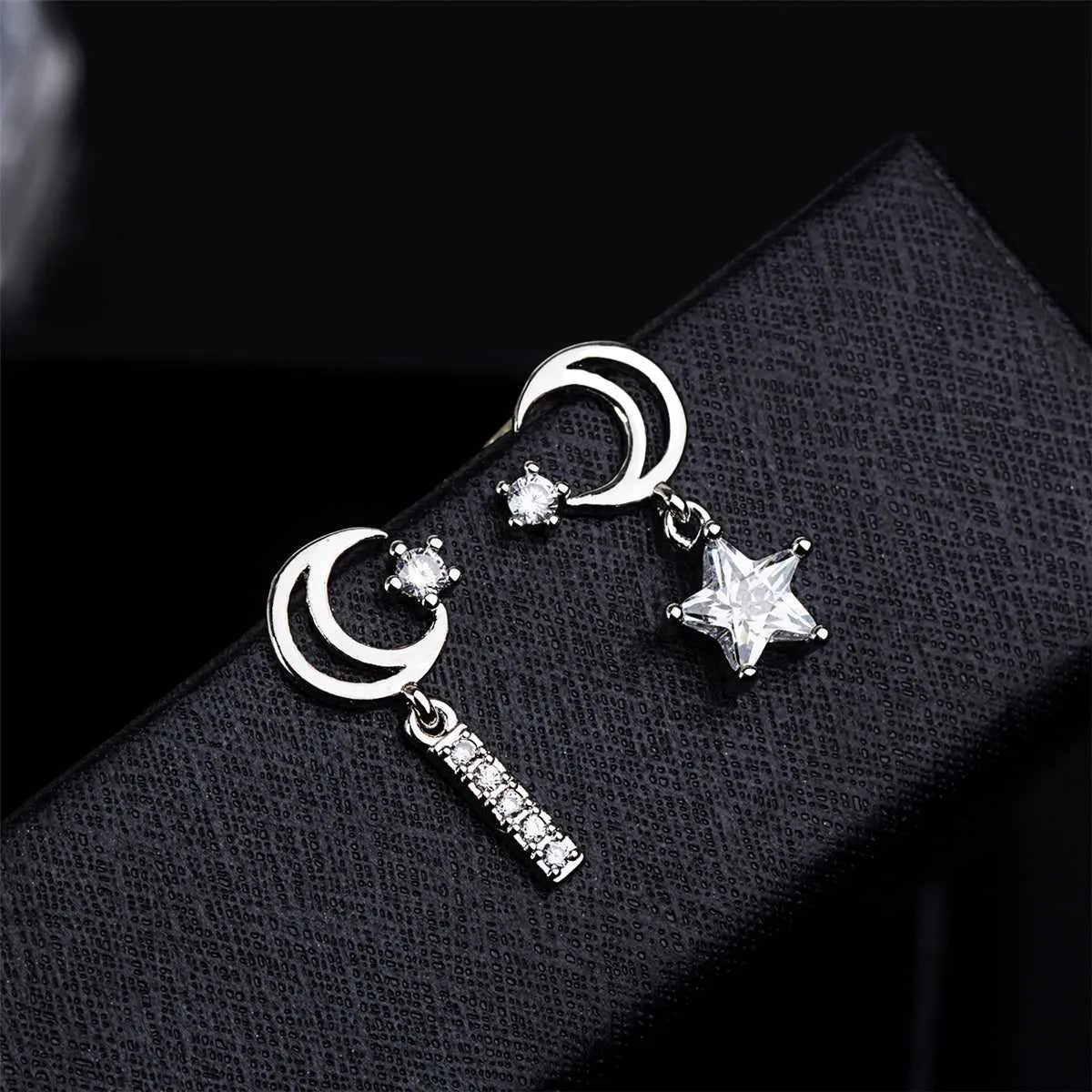 Cubic Zirconia & Silvertone Star & Moon Drop Earrings sold by Zulily