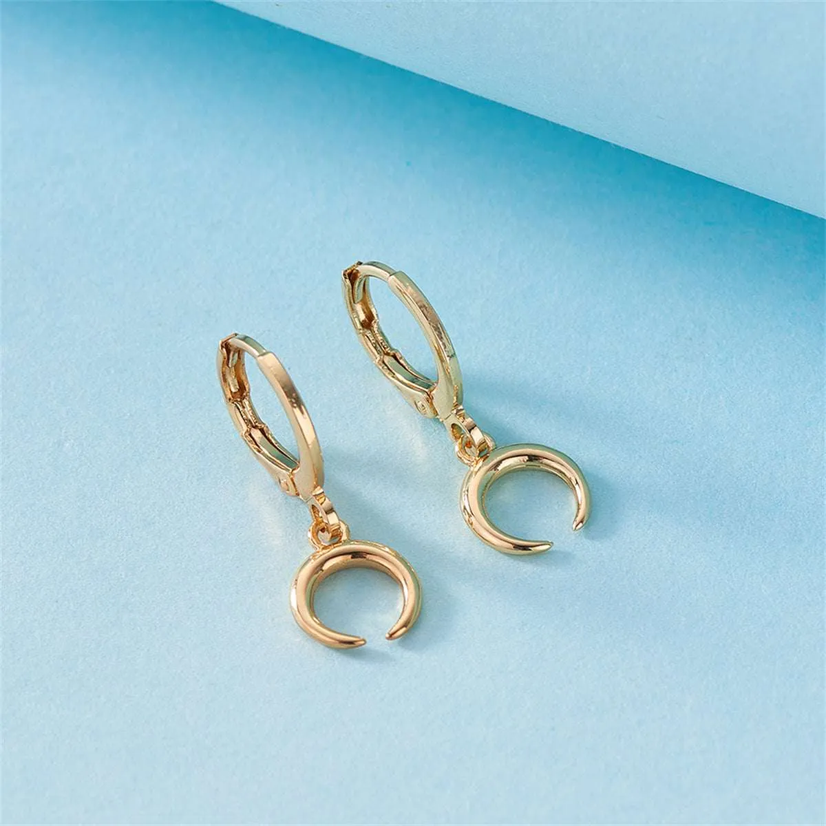 Goldtone Crescent Moon Huggie Earrings sold by Zulily product image thumbnail 3