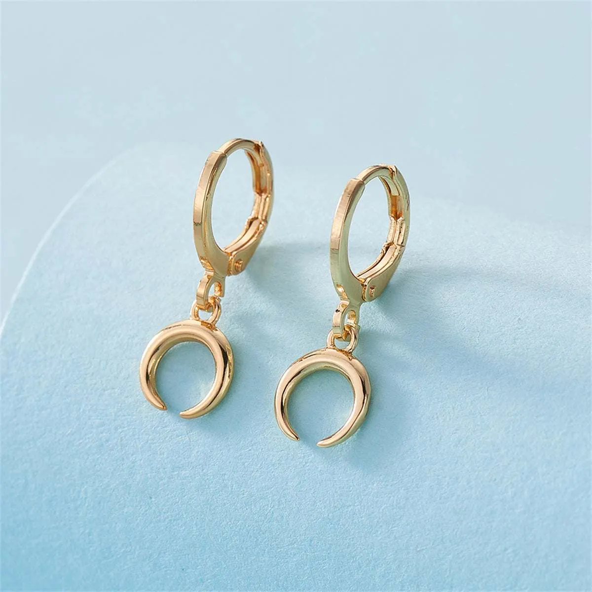 Goldtone Crescent Moon Huggie Earrings sold by Zulily product image thumbnail 2