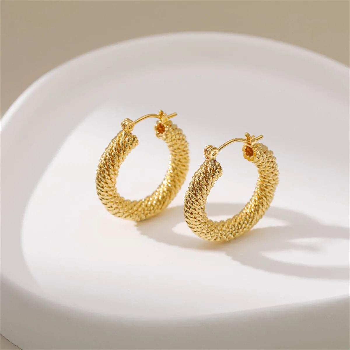 Goldtone Twisted Thread Hoop Earrings sold by Zulily product image thumbnail 2